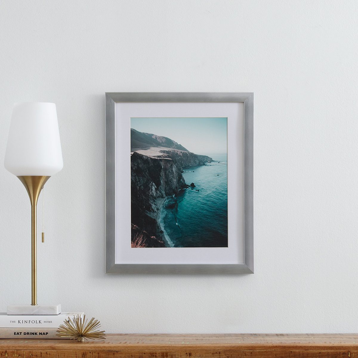 Amazon Brand – Stone & Beam Modern Photo of Rocky Cliffs by Sea in Silver Frame, 18" x 22"