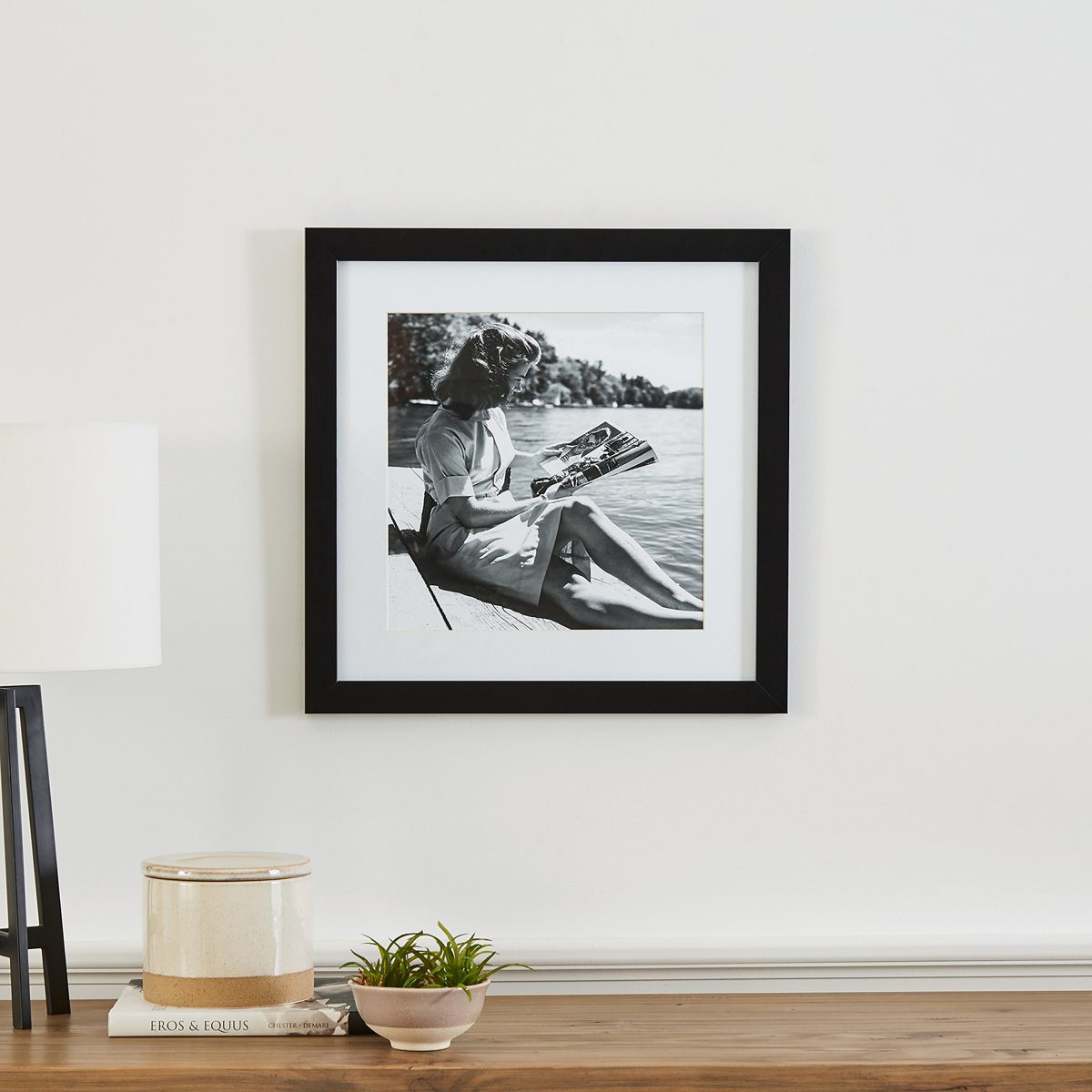 Amazon Brand – Stone & Beam Black and White Reading by the Water Photo Wall Art Decor - 18" x 18" Picture Frame, Black