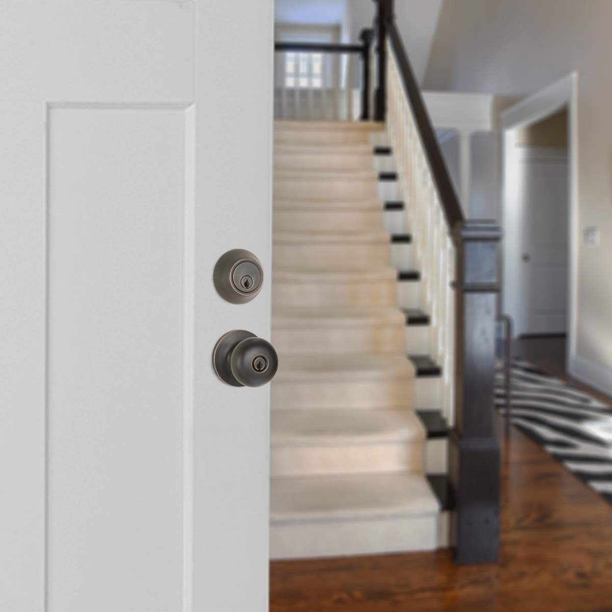 AmazonBasics Exterior Door Knob With Lock and Deadbolt, Round, Oil Rubbed Bronze