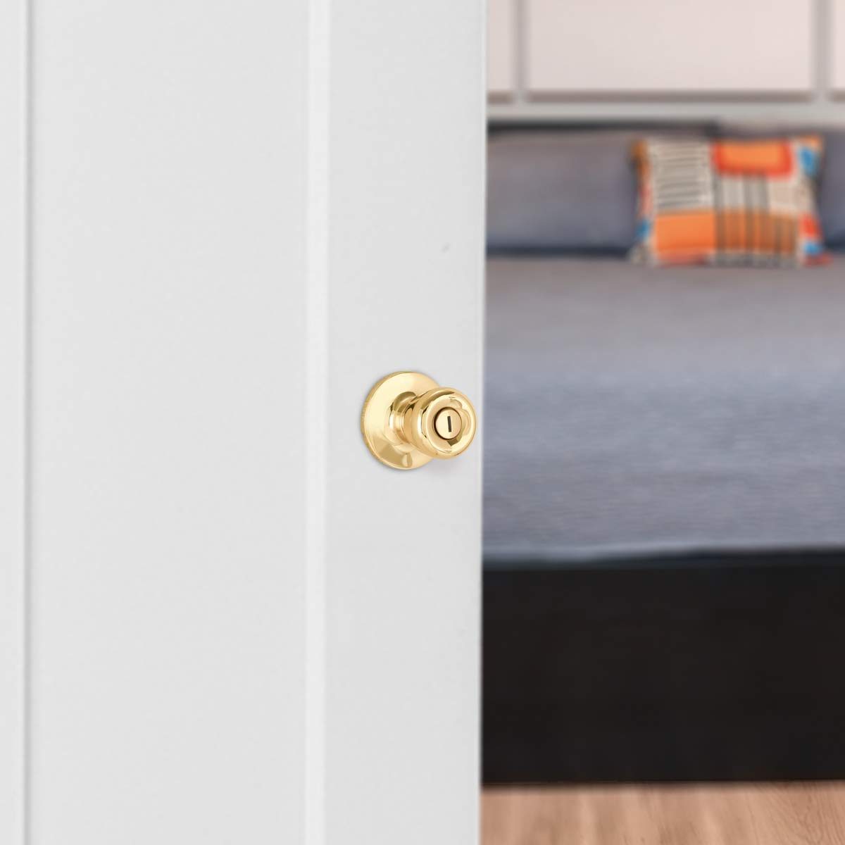 AmazonBasics Bedroom/Bathroom Door Knob With Lock, Bell, Polished Brass