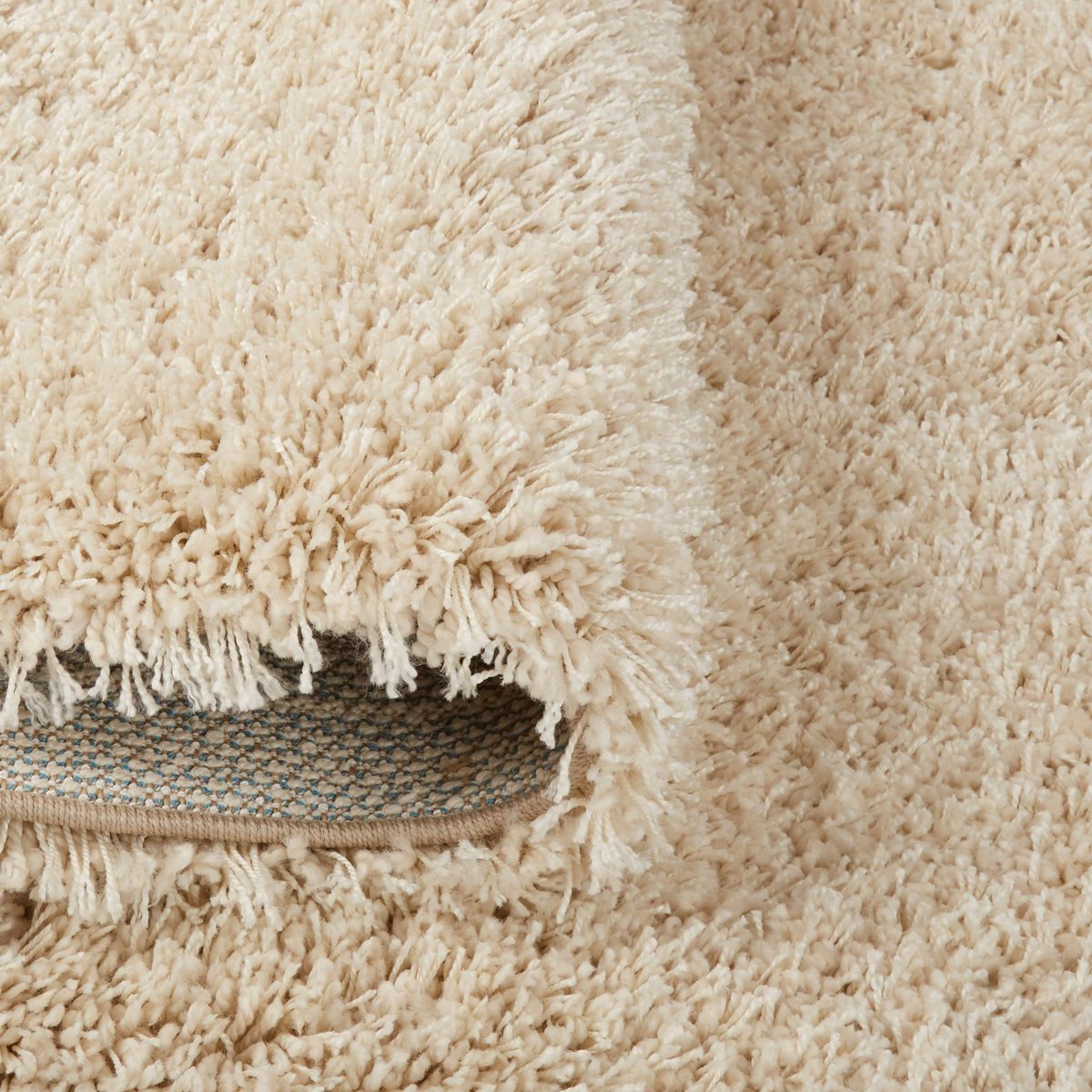 Amazon Basics Modern Plush High-Pile Shag Area Rug - 6x9 (5'11" x 8'10"), Beige