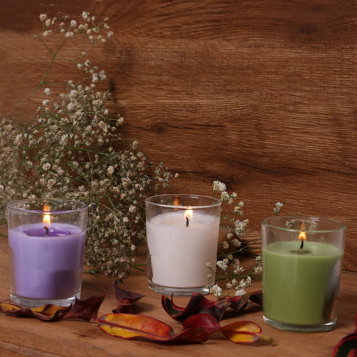 Amazon Brand - Solimo Votive Glass Candles, Pack of 12 (Scented - Jasmine, Lavender &Â Lemon Grass)