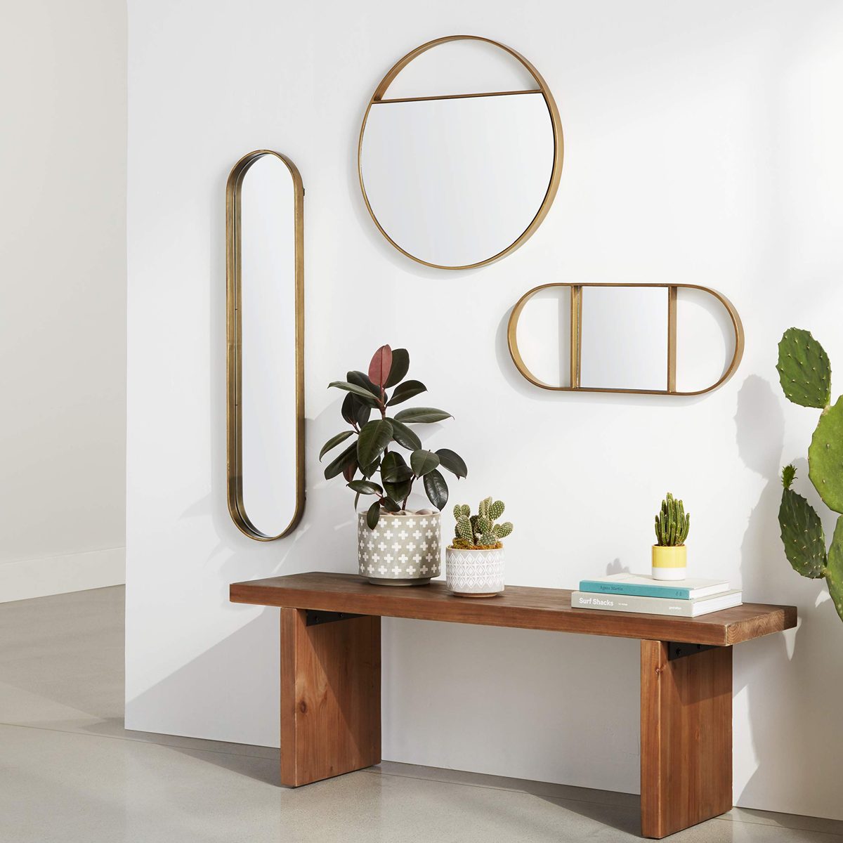 Amazon Brand - Rivet Modern Round Cutout Hanging Mirror, 22.25" Diameter, Gold