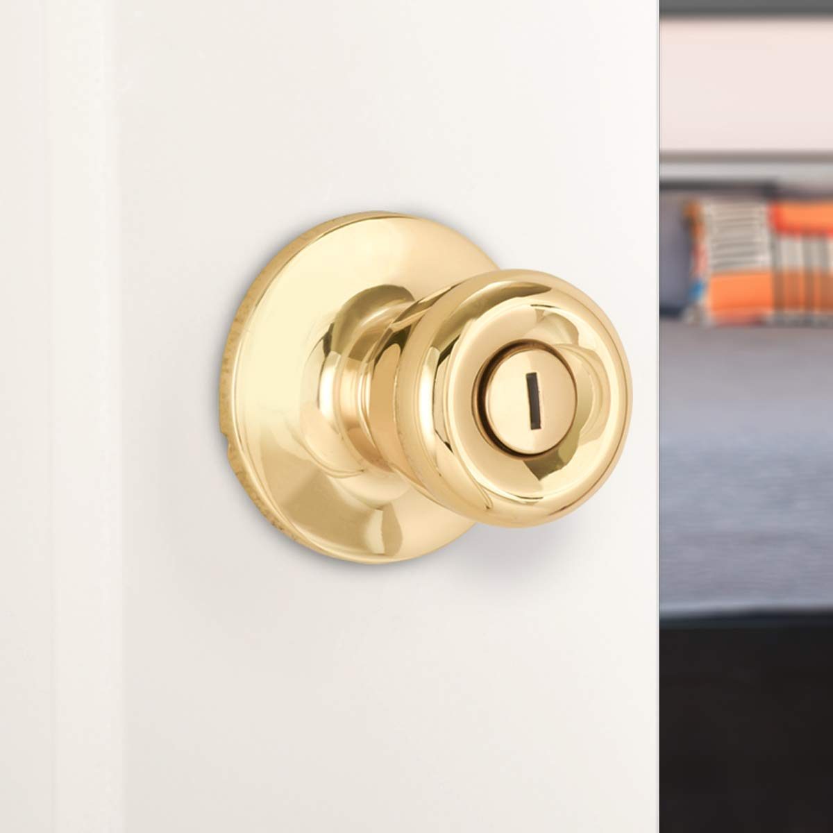 AmazonBasics Bedroom/Bathroom Door Knob With Lock, Bell, Polished Brass