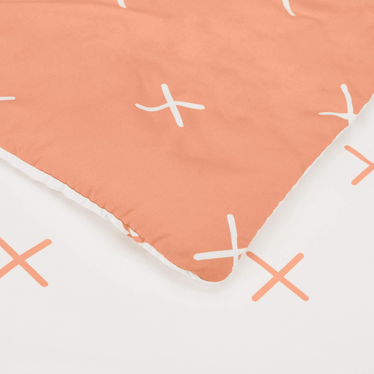 AmazonBasics College Dorm Bed-in-a-Bag with Elastic Storage Pockets - Full/Queen - Salmon X's